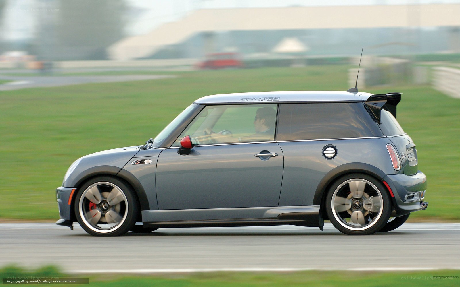 gray mini cooper on racetrack