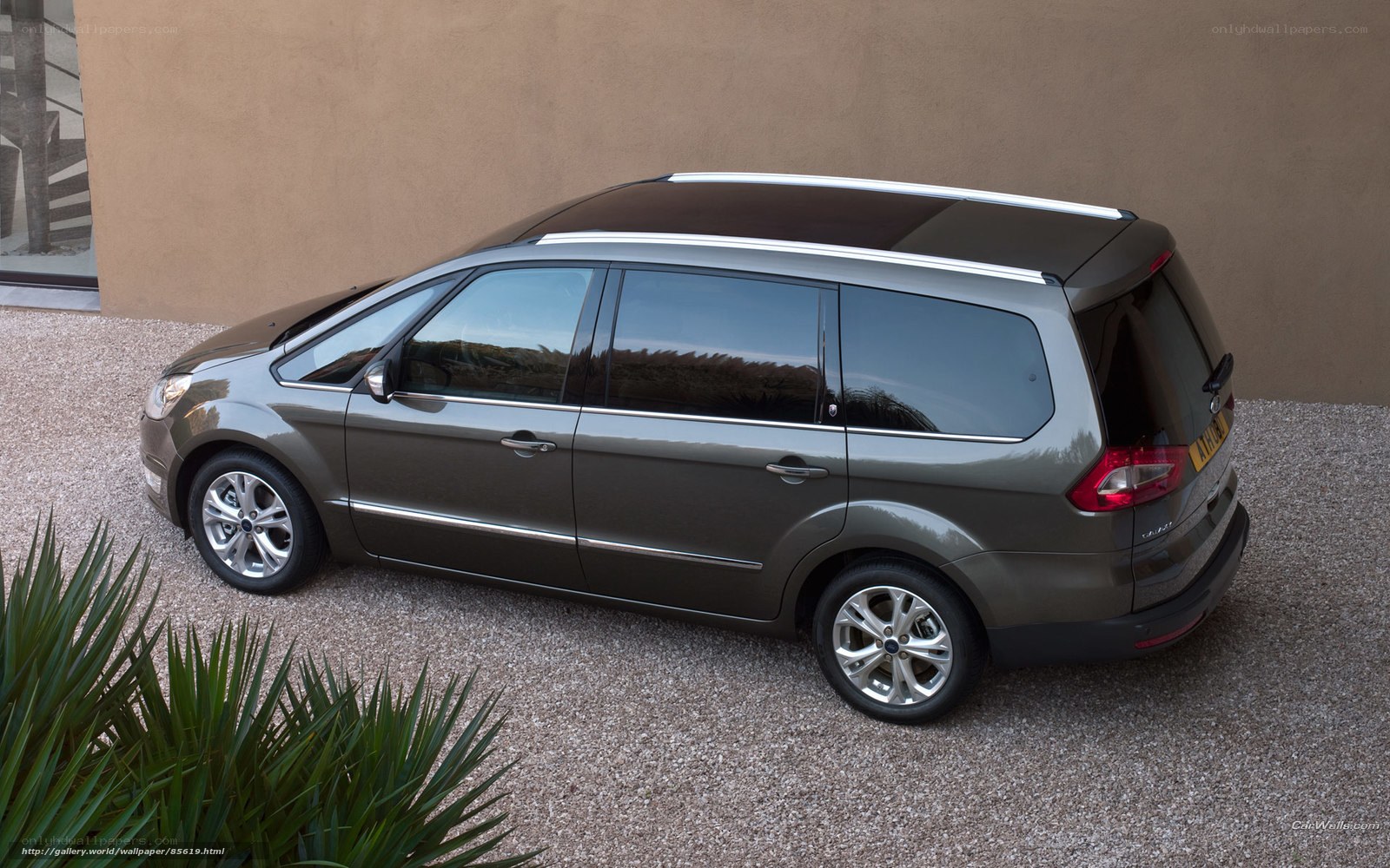 gray minivan parked outside