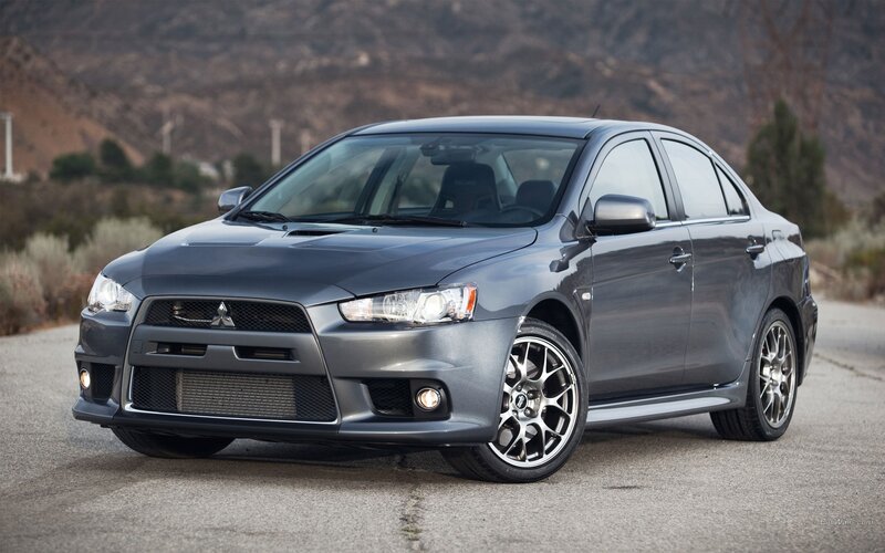 Gray Mitsubishi Lancer — Dramatic, Afternoon