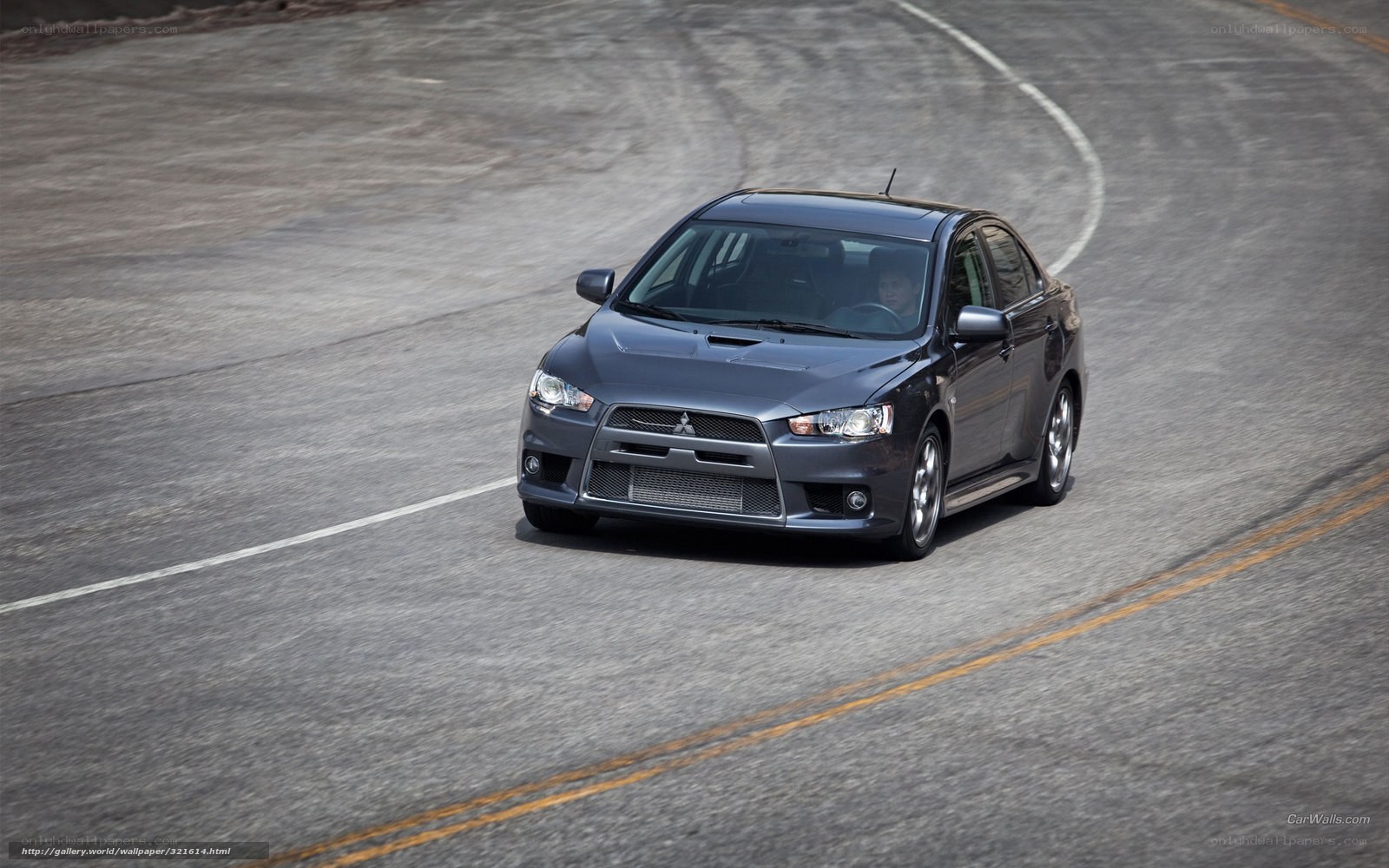 gray mitsubishi on racetrack