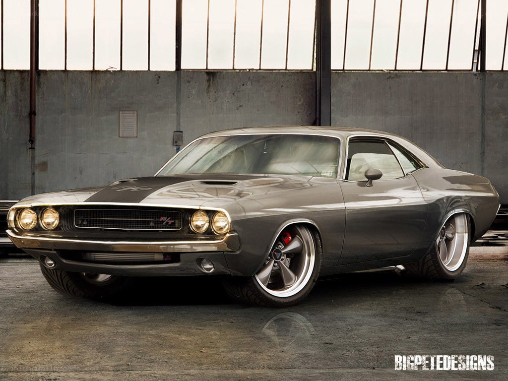 gray muscle car in garage