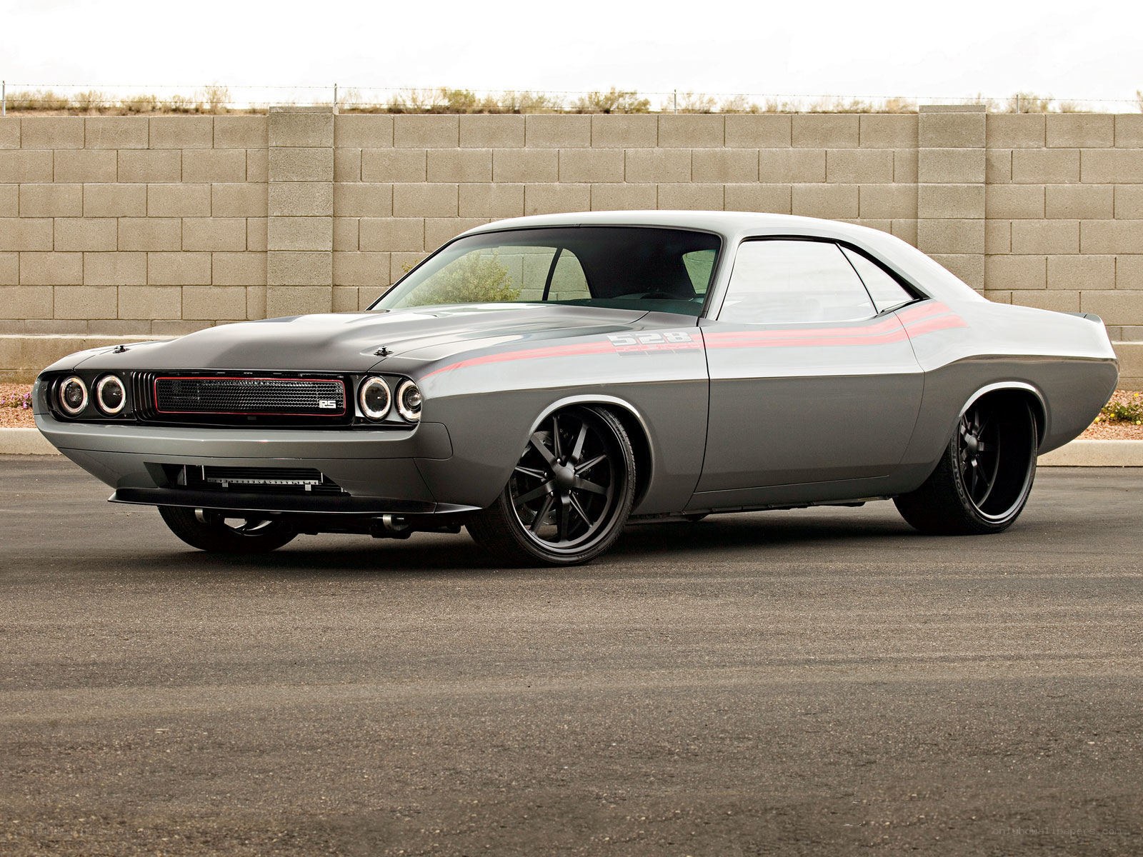 gray muscle car with stripes