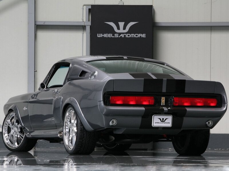 gray muscle car with stripes