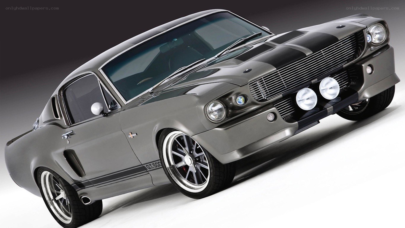 gray muscle car with stripes