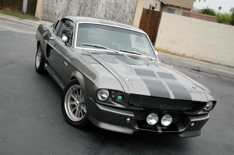 gray muscle car with stripes