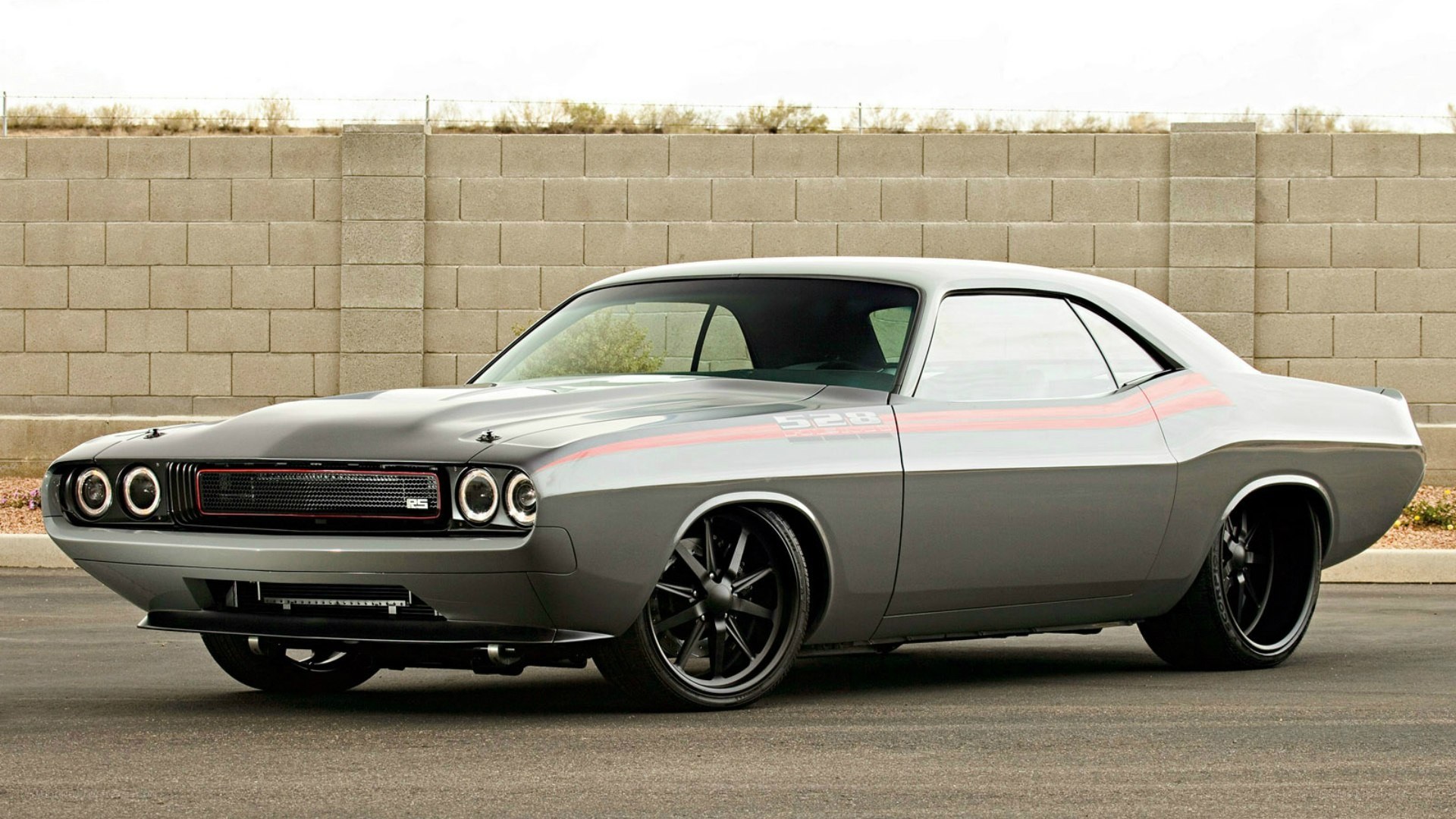 gray muscle car with stripes