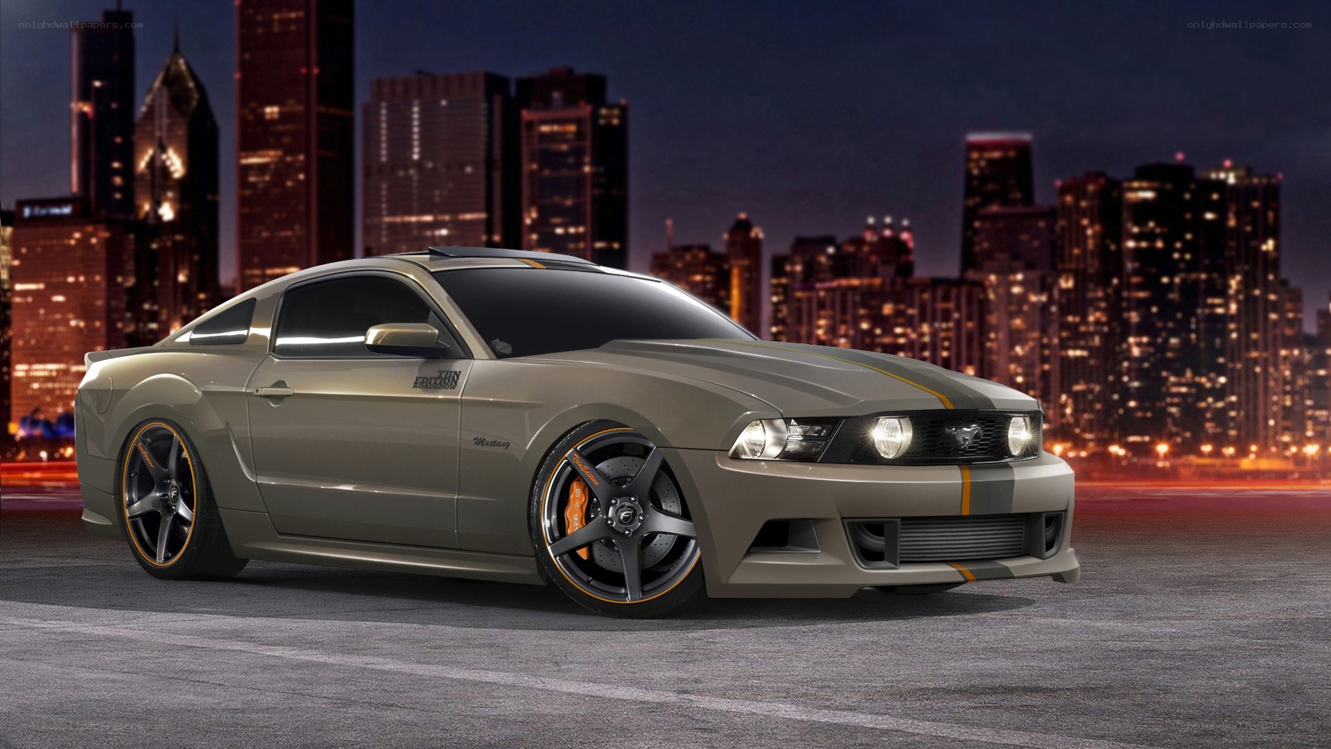 gray mustang on city street
