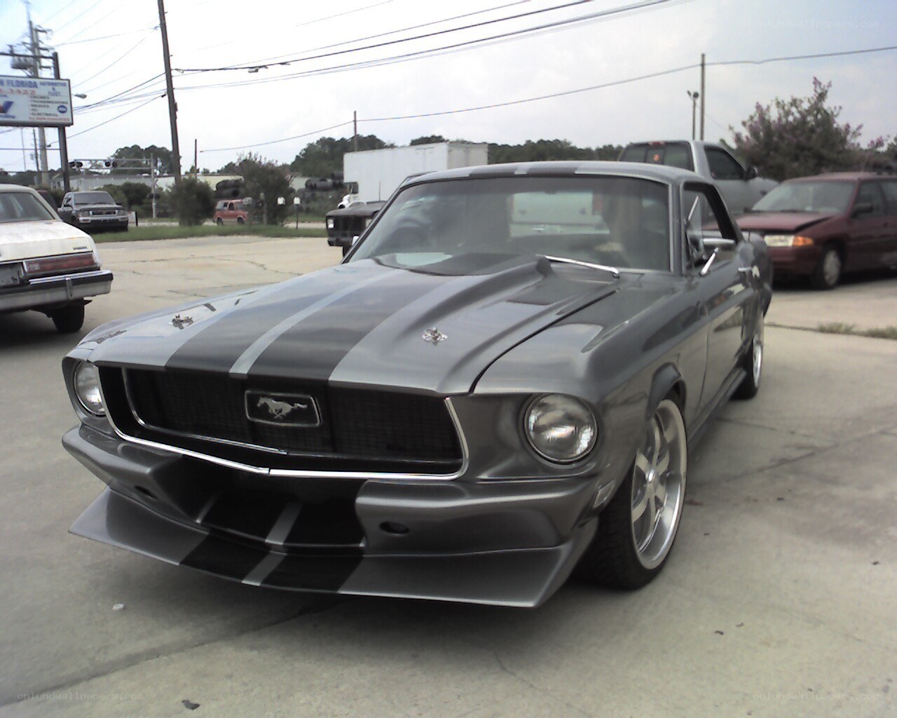 gray mustang with racing stripes