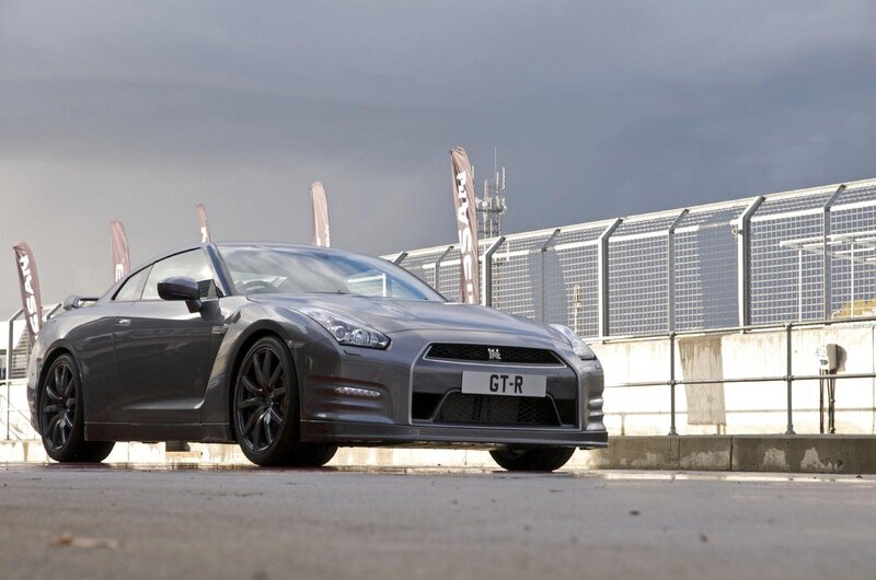 Gray Nissan GT-R on a racetrack