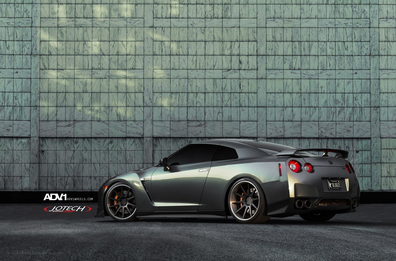 gray nissan gt-r on tiled wall