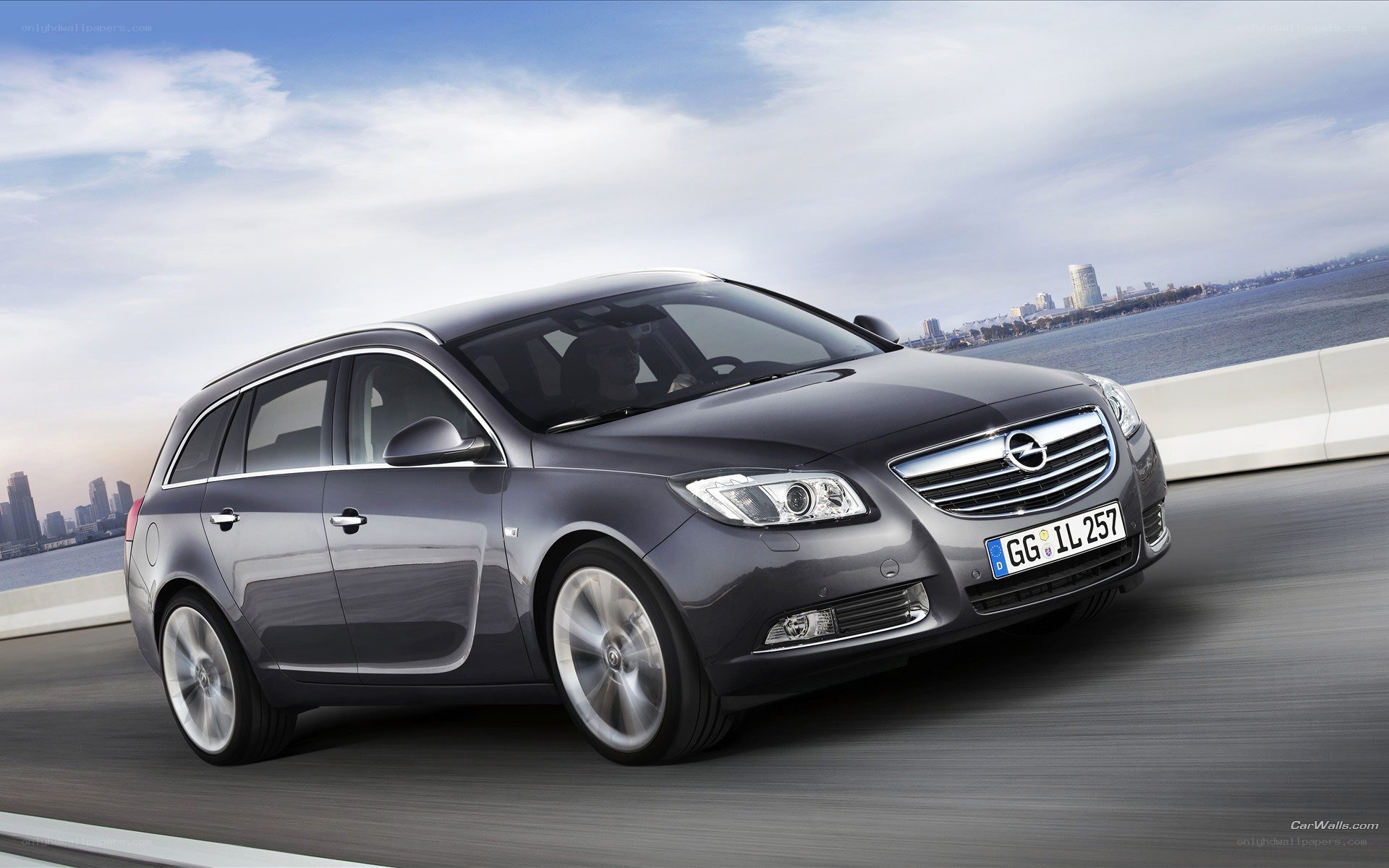 gray opel in motion