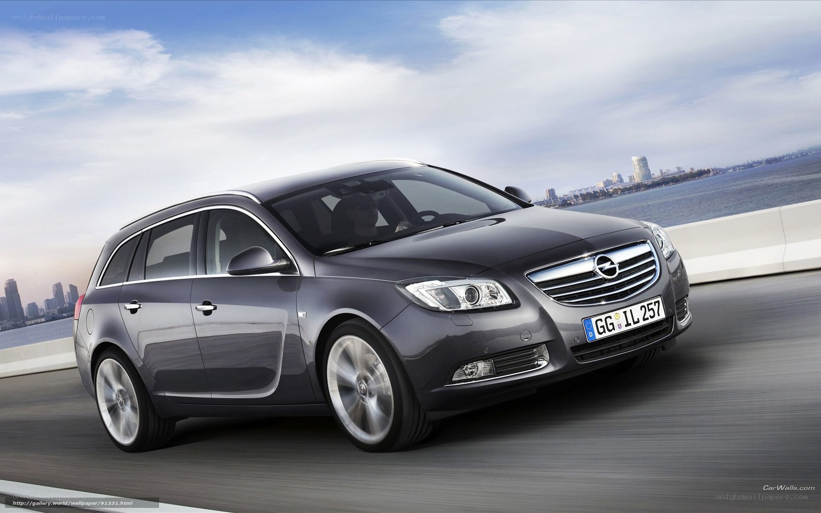 gray opel in motion