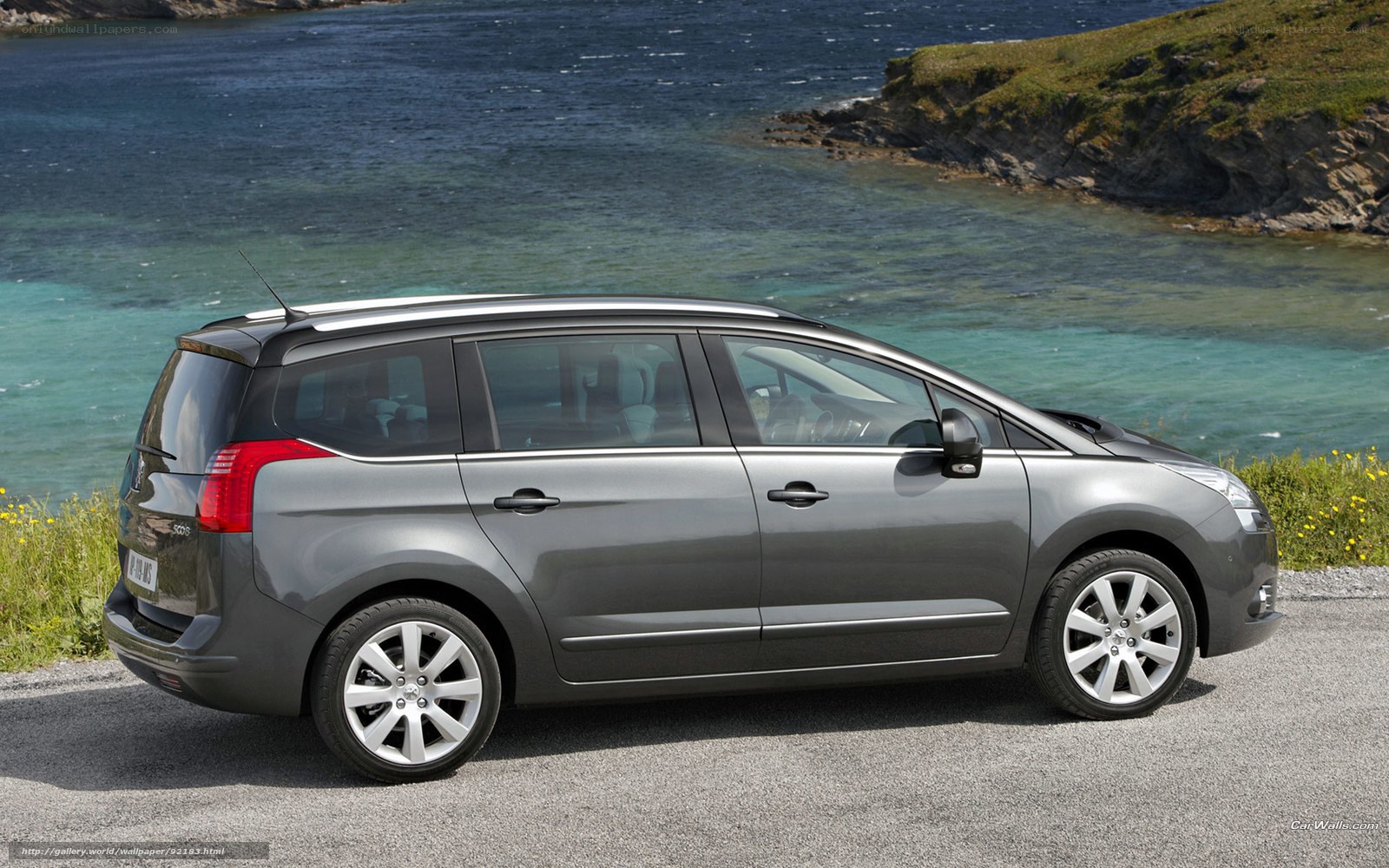 Gray Peugeot 5008 by the coast