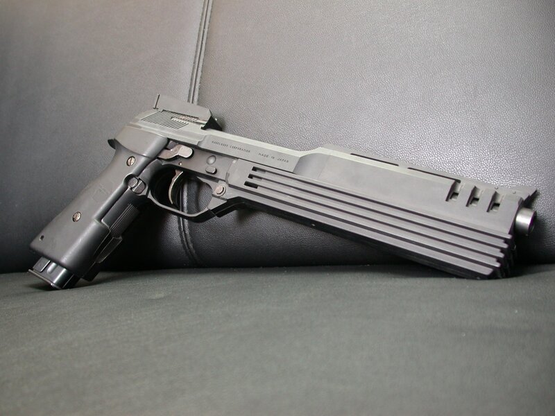 gray pistol on leather