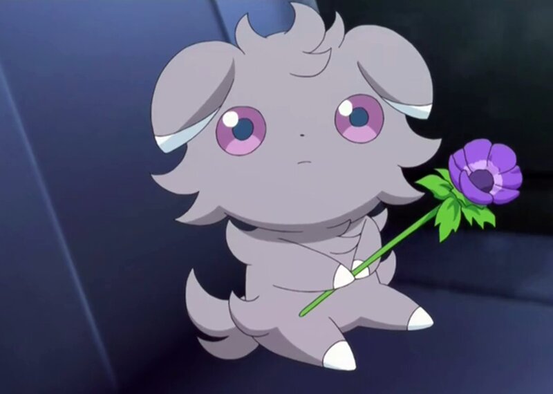 Gray Pokémon Holding Flower