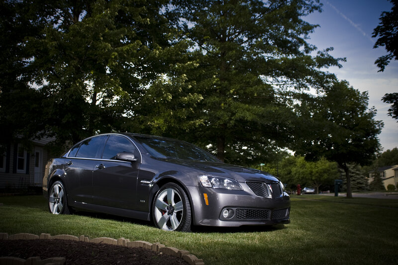 gray pontiac g8 on lawn