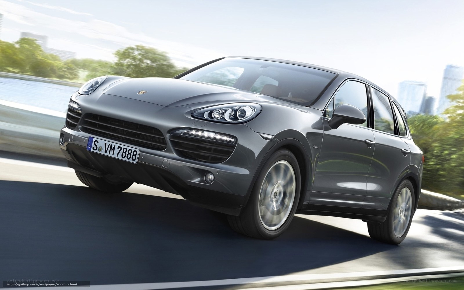 Gray Porsche Cayenne in motion