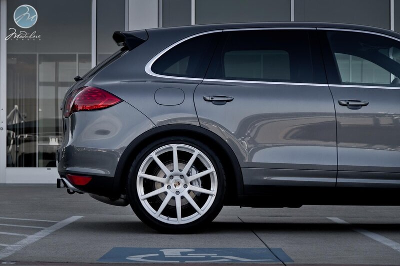Gray Porsche Cayenne with custom wheels