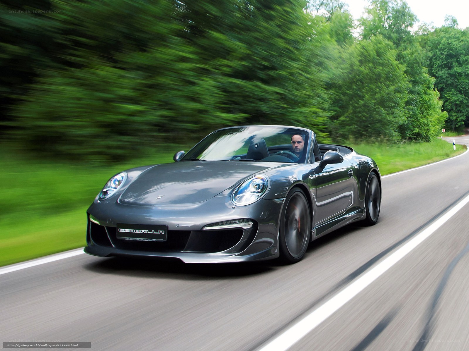 gray porsche convertible on road