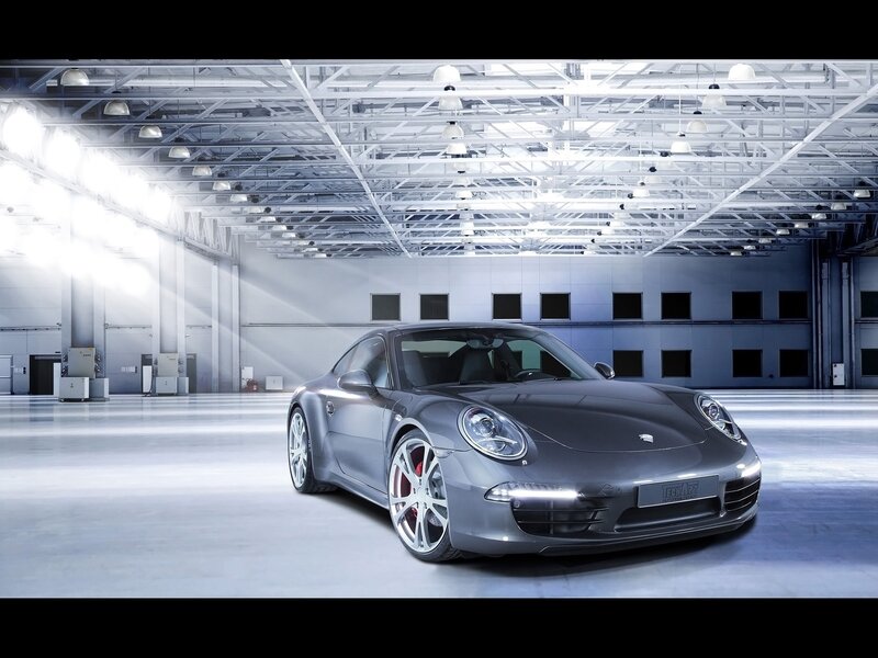Gray Porsche in a warehouse