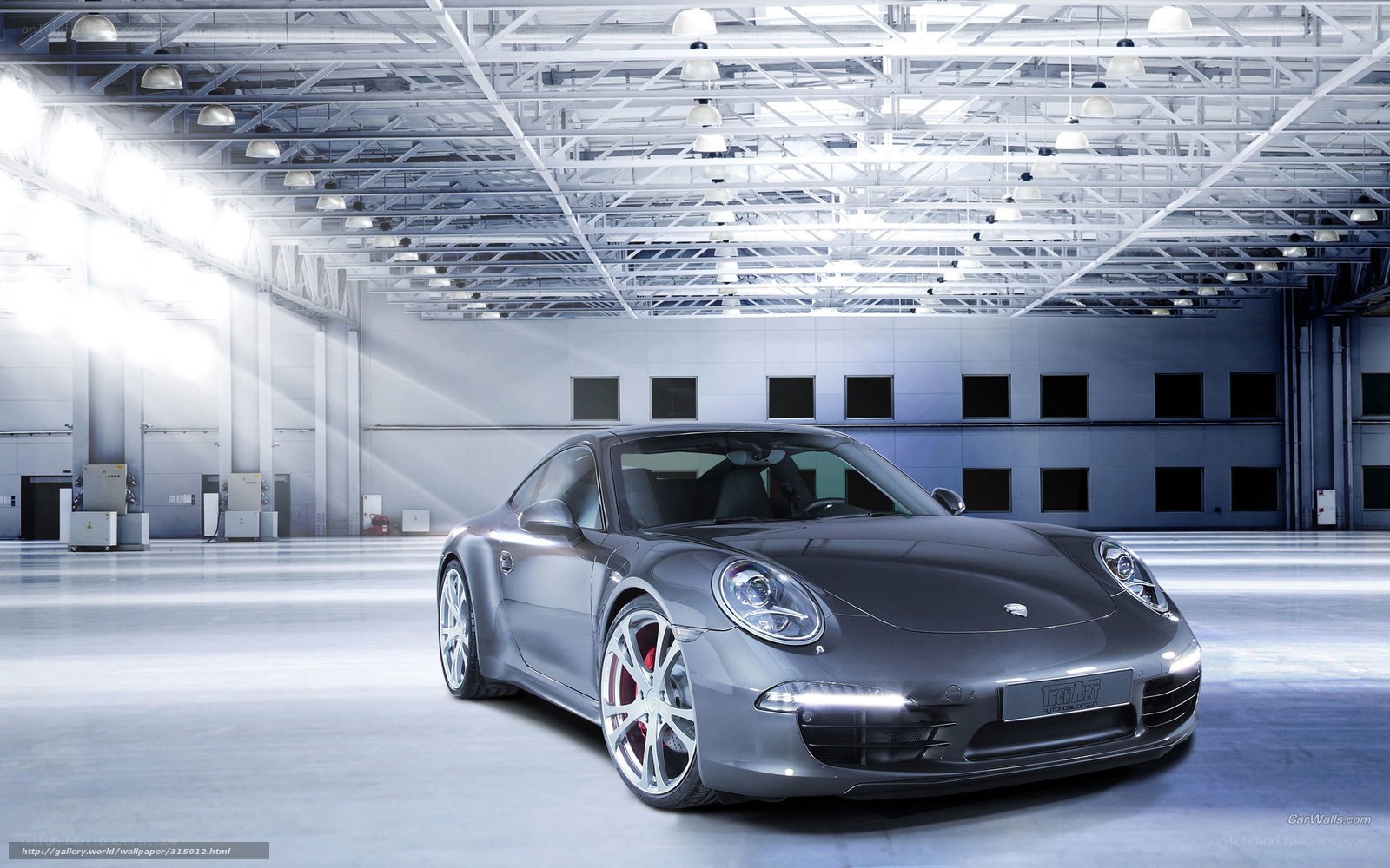 Gray Porsche in a warehouse