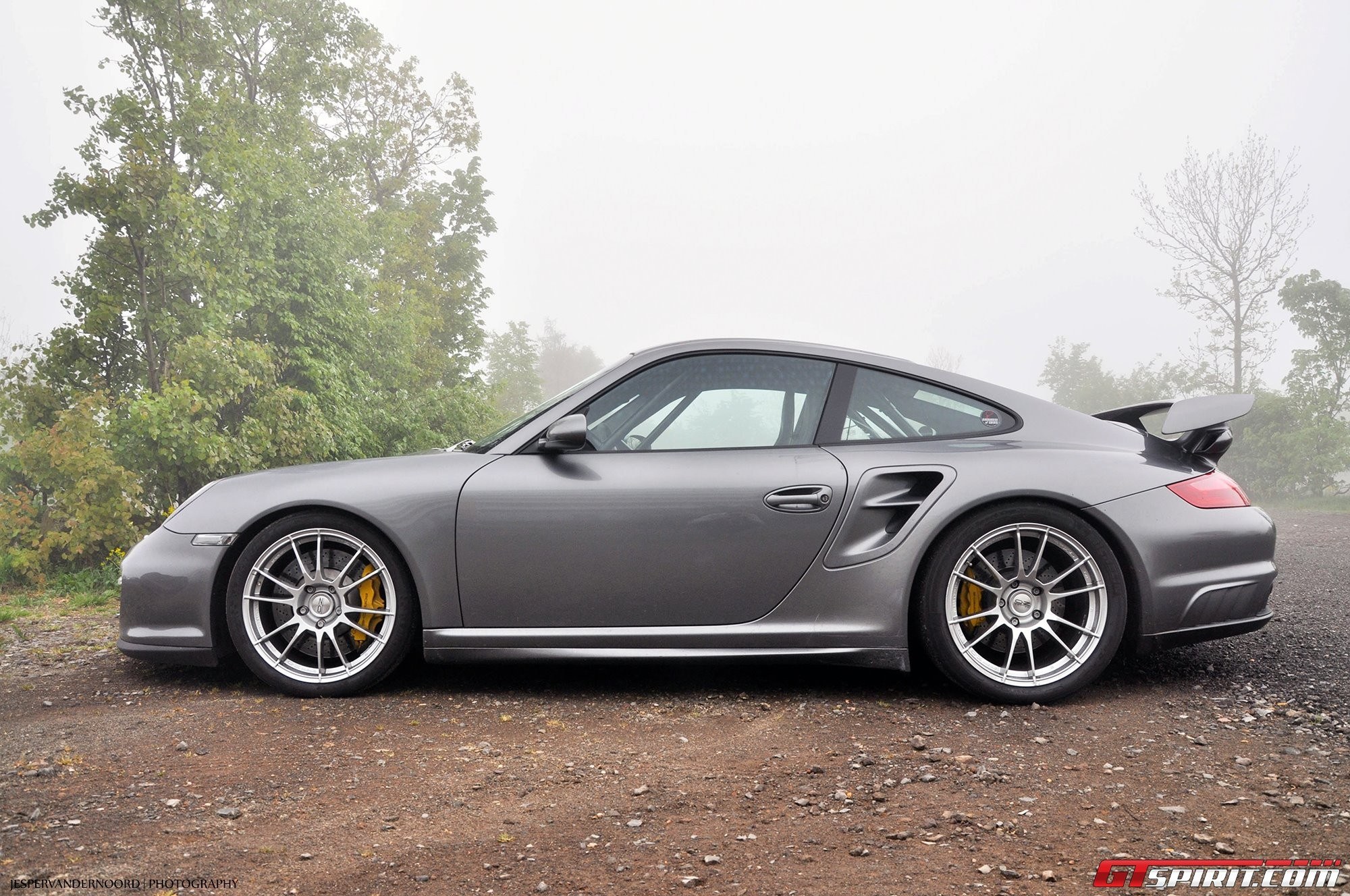 gray porsche in fog