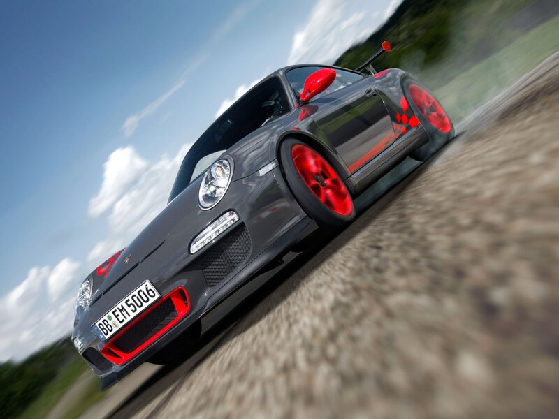 gray porsche on a racetrack