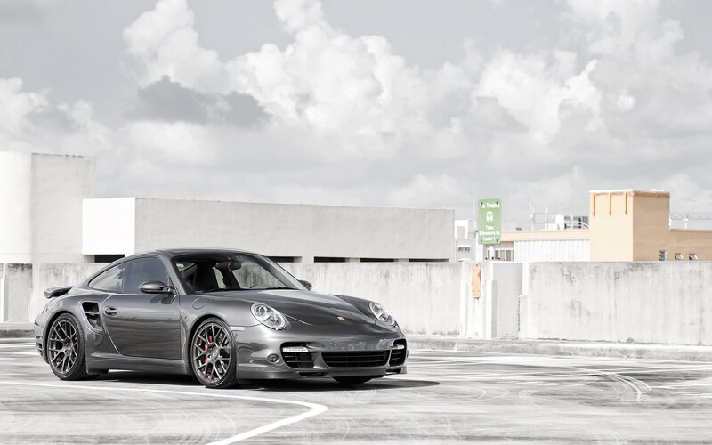 Gray Porsche on a rooftop