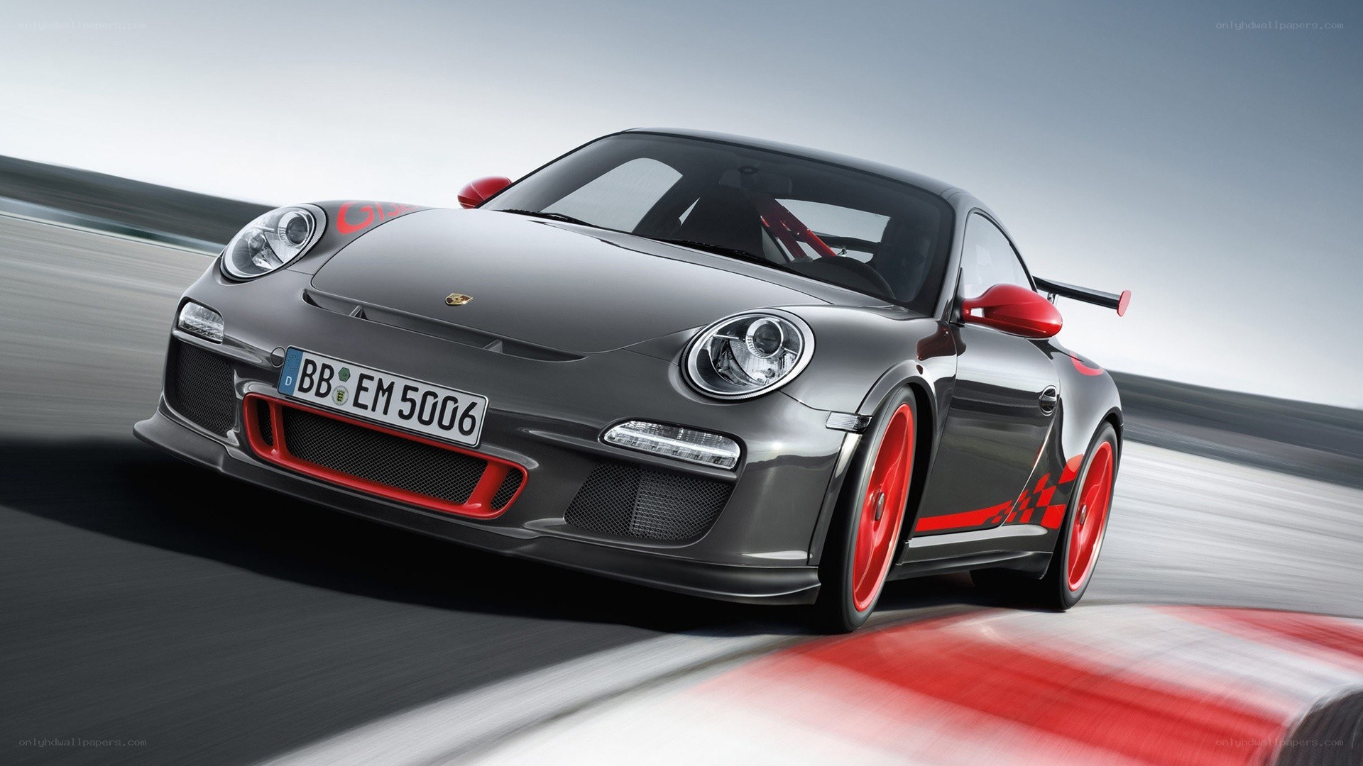 gray porsche on racetrack