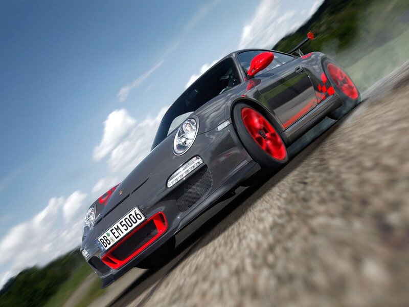 gray porsche on racetrack