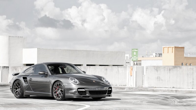 gray porsche on rooftop
