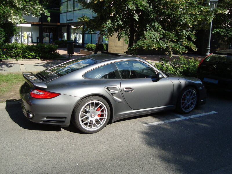 Gray Porsche parked on street