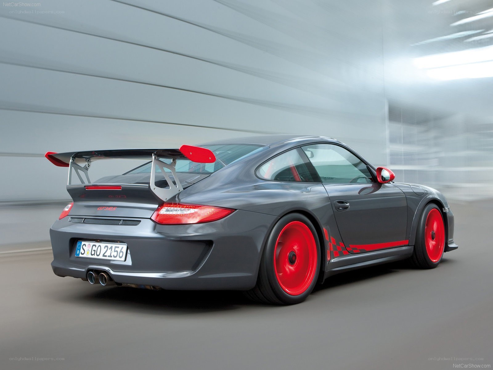 gray porsche with red accents
