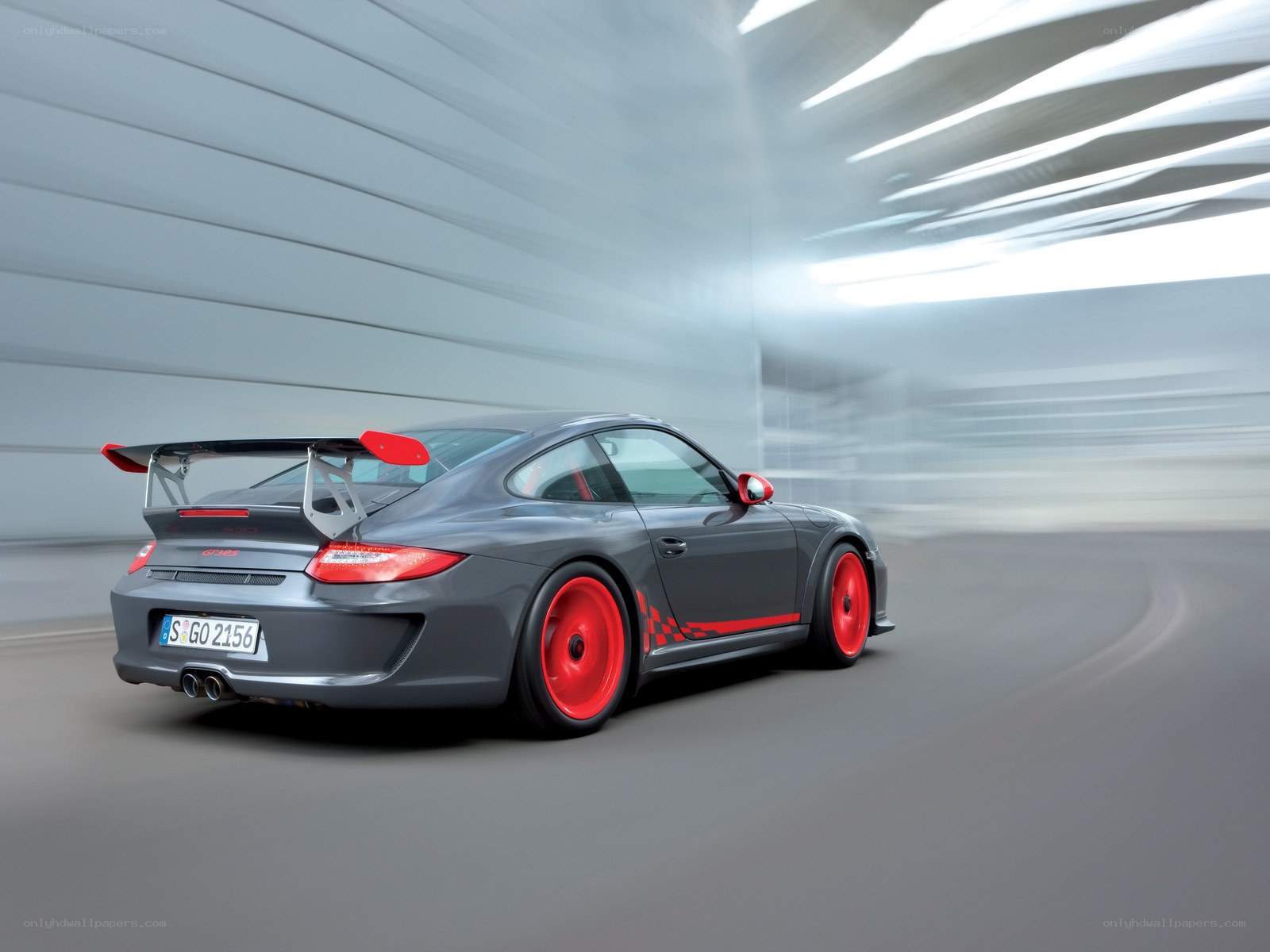 gray porsche with red accents