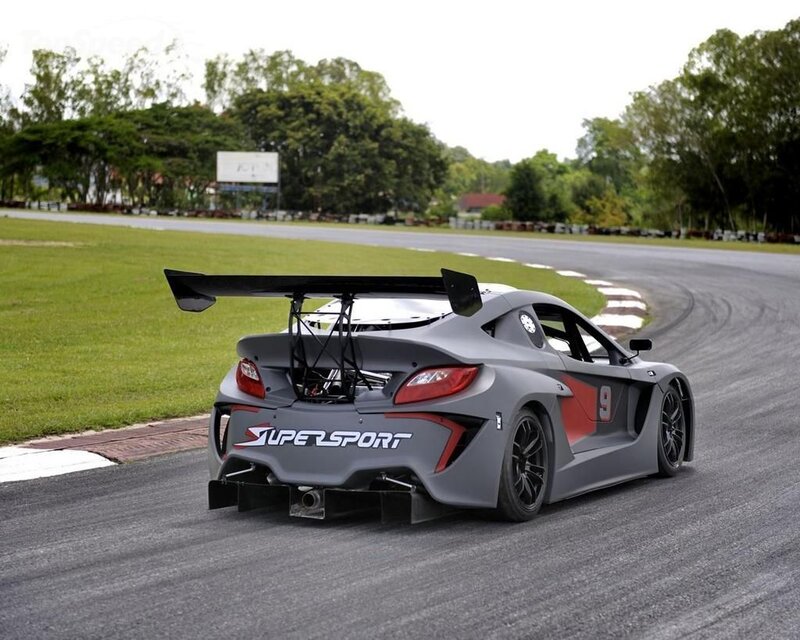 Gray Race Car on Track — Dynamic