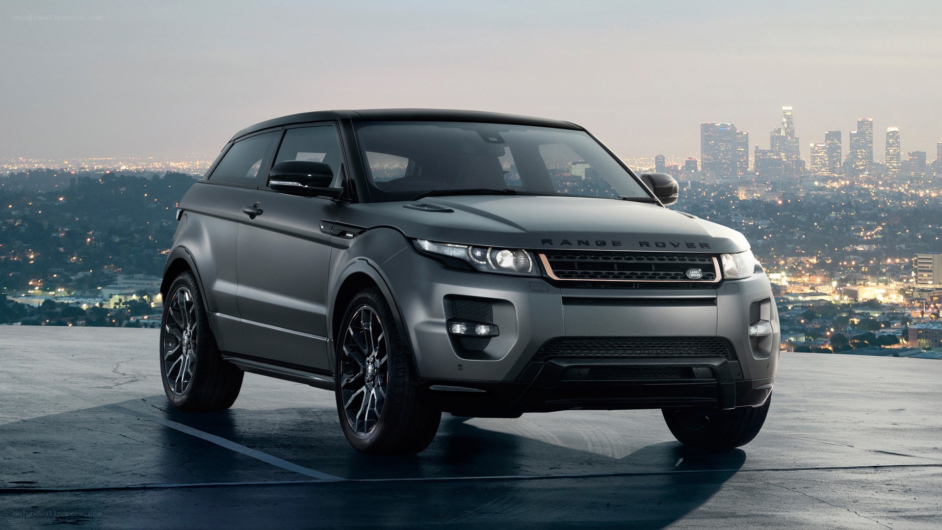 Gray Range Rover on rooftop