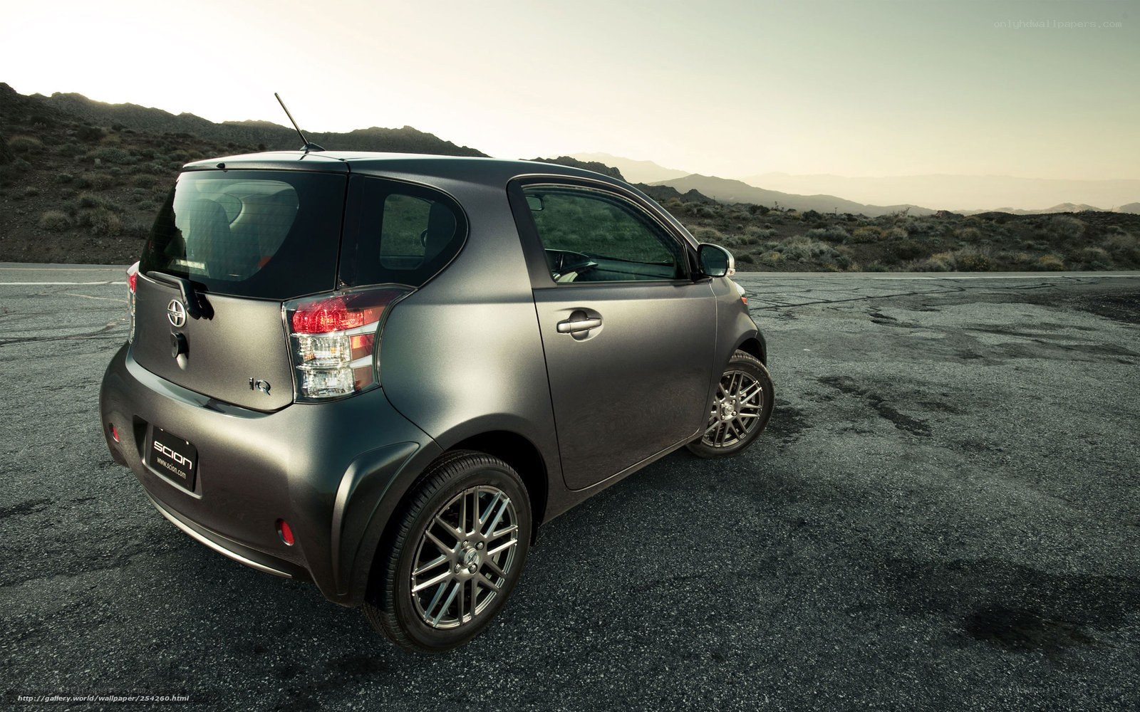 Gray Scion iQ in desert
