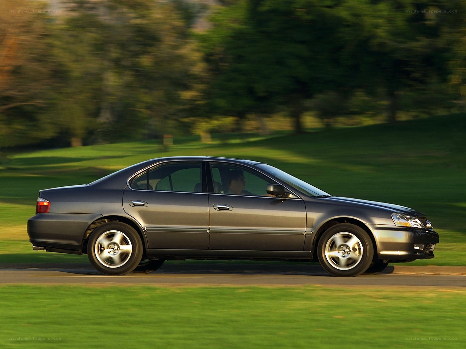 gray sedan in motion