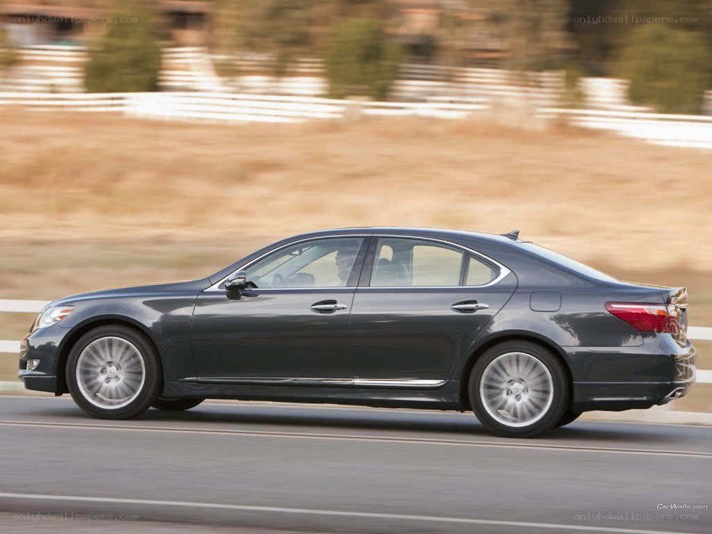 gray sedan in motion