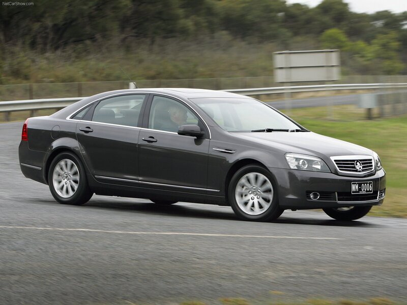 gray sedan in motion