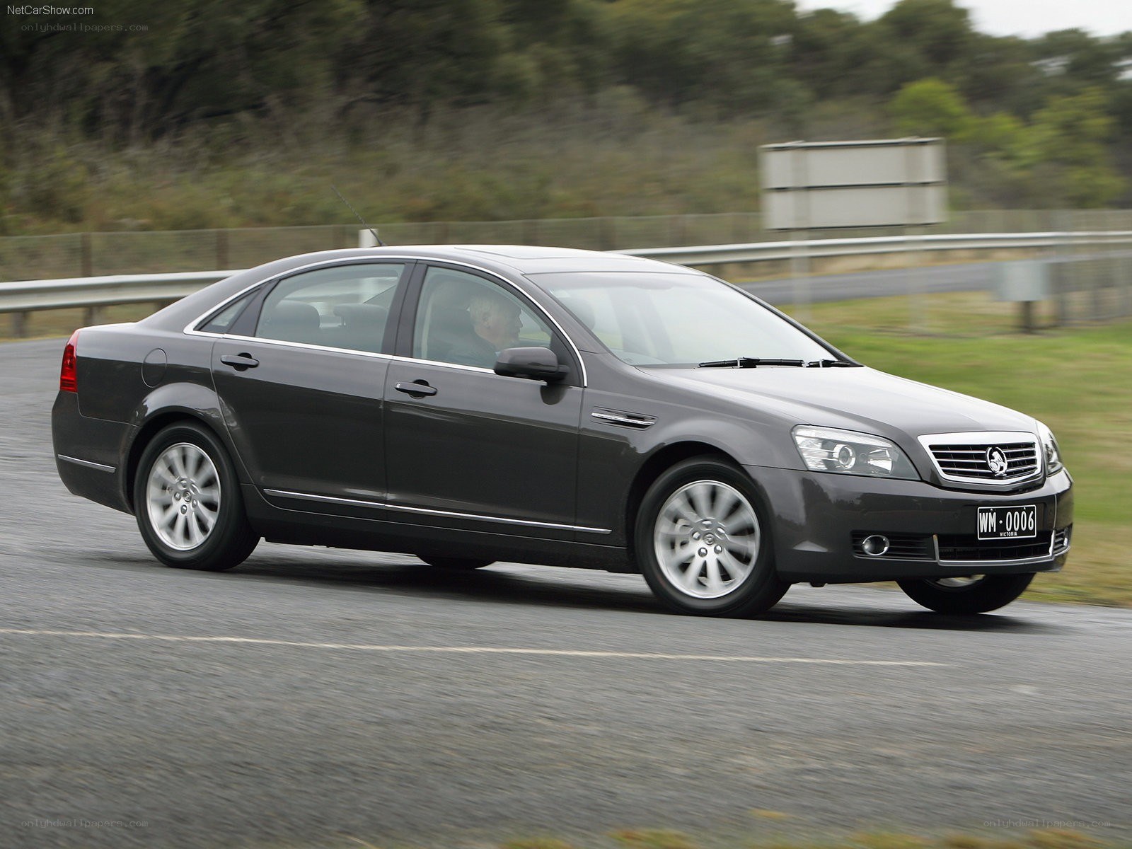 gray sedan in motion
