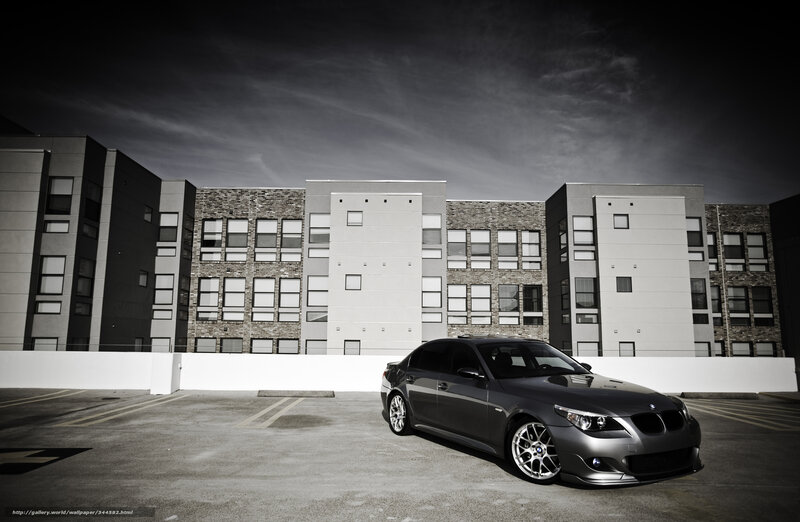 gray sedan in parking lot