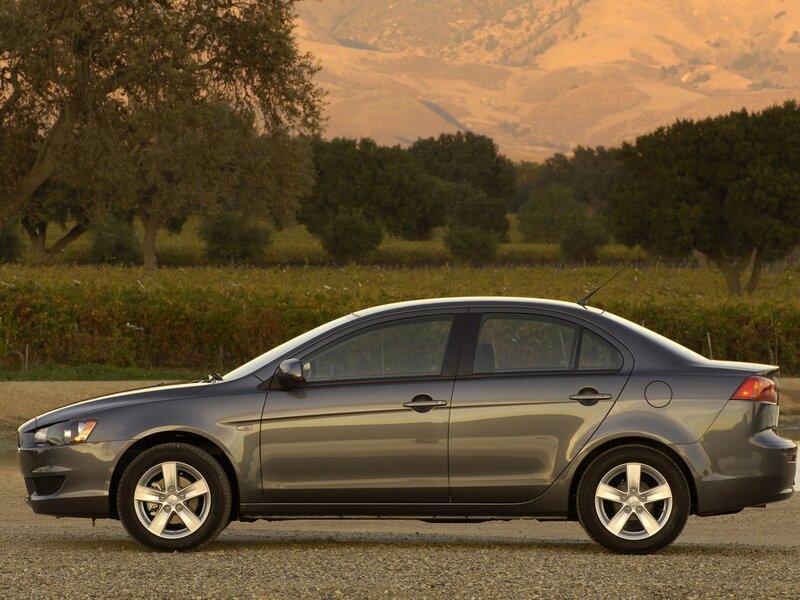 gray sedan in vineyard