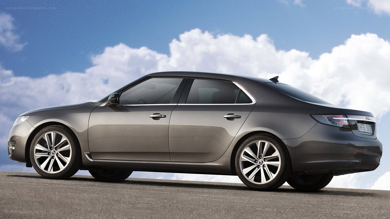 gray sedan on a road