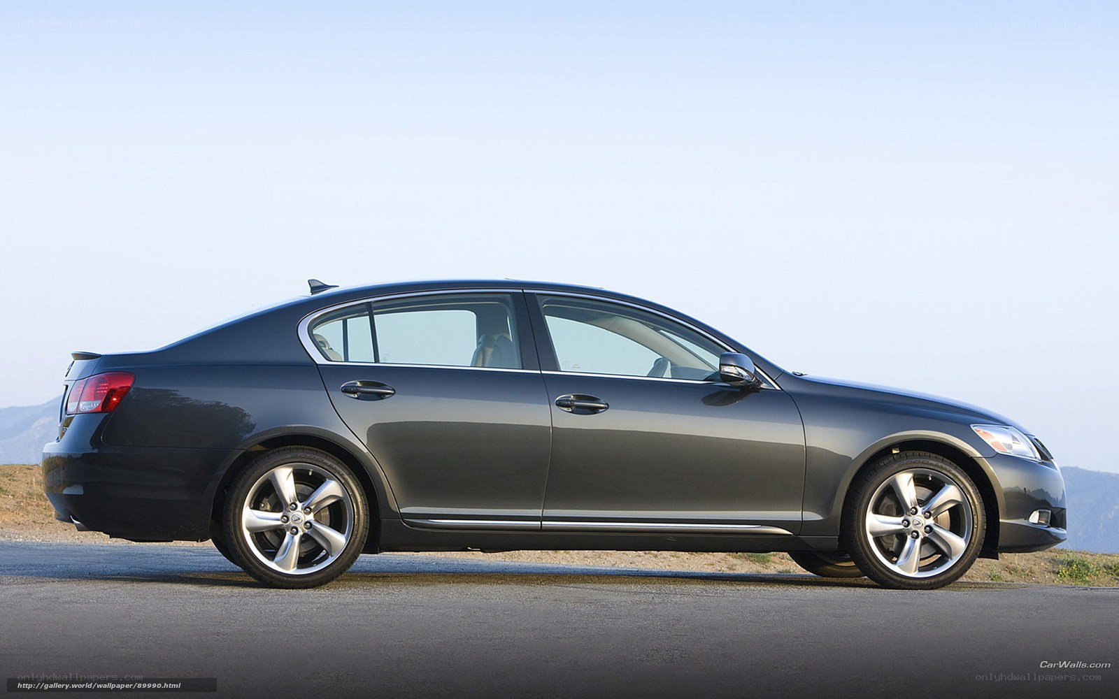 gray sedan on a road