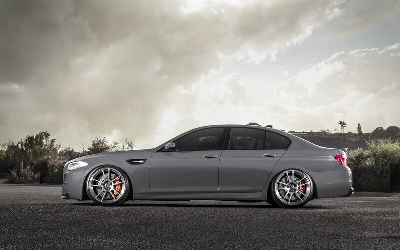 gray sedan on asphalt