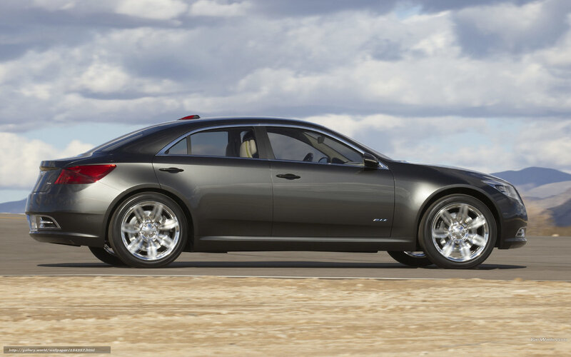 gray sedan on desert road