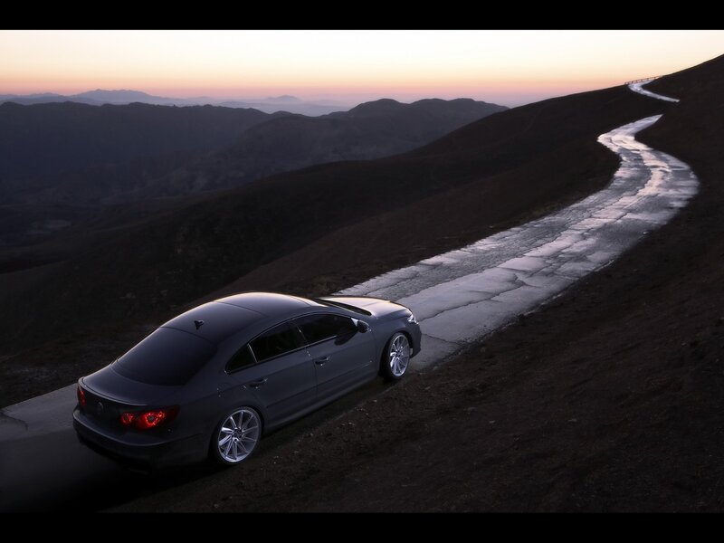 Gray Sedan on Mountain Road