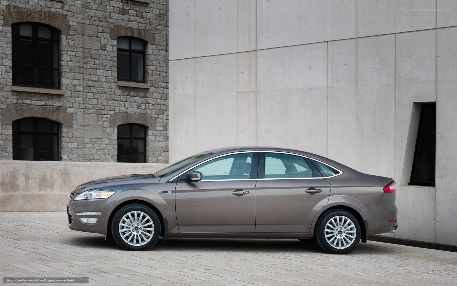 Gray sedan parked in urban setting