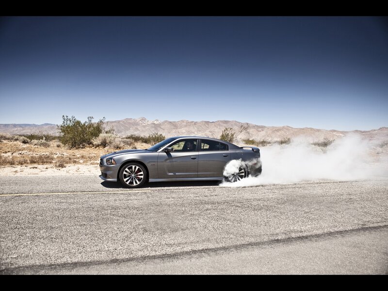 Gray Sedan Performing Burnout — Dramatic
